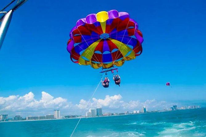 Swim & Fly Day Trip in Cancun with Transportation - Exciting Water Adventure Combining Parasailing and Snorkeling in Cancun