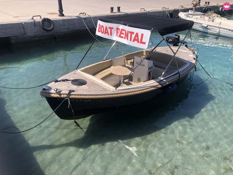 Swim to Antony Quinn bay Ladiko & Traunou caves with skipper - Discover the Private Boat Experience from Faliraki to Rhodes Iconic Spots