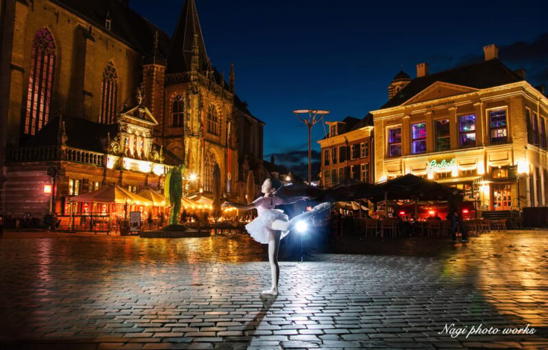 Take photographs of advertising posters with family photos - Meeting Point and Flexible Locations in Amsterdam