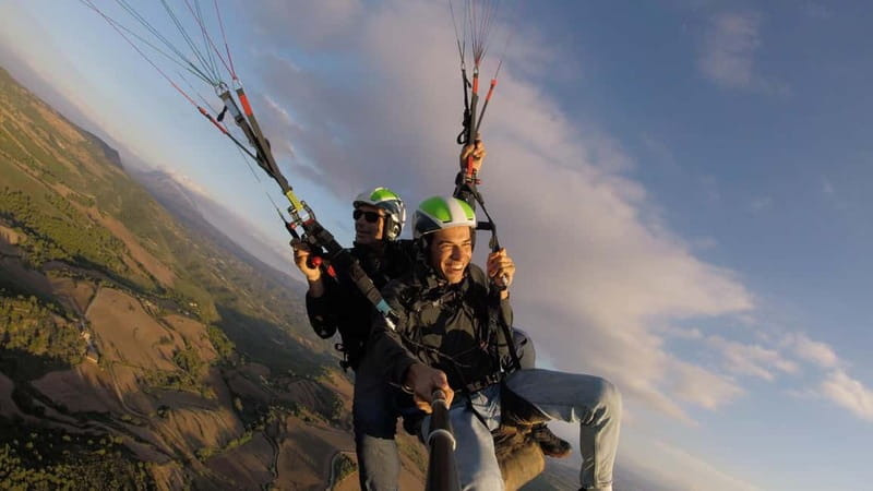 Tandem Paragliding over Barcelona + Transport - Launching from the Picturesque Mountains of Catalonia