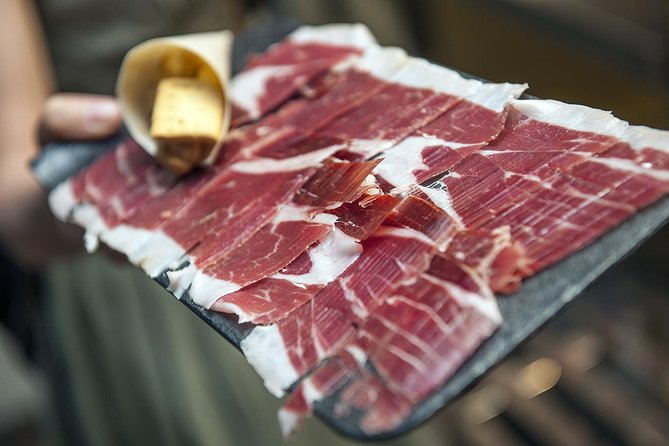 Tapas & Traditions of Seville Guided Food Tour - The Colorful Atmosphere of La Fresquita and Tinto de Verano