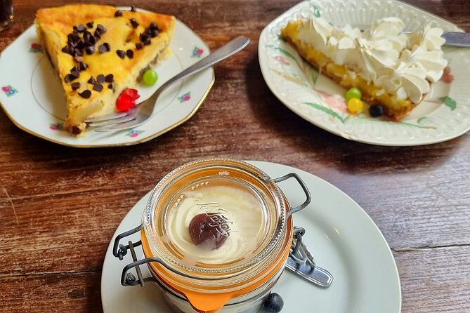 Taste Avignon A Full French Culinary Tour by Do Eat Better - Enjoying a Slice of Traditional Quiche with Wine in Rue de la République