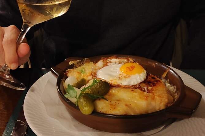 Taste Lausanne  A Full Swiss Food Tour by Do Eat Better - Enjoying the Classic Rösti on Rue de lAle