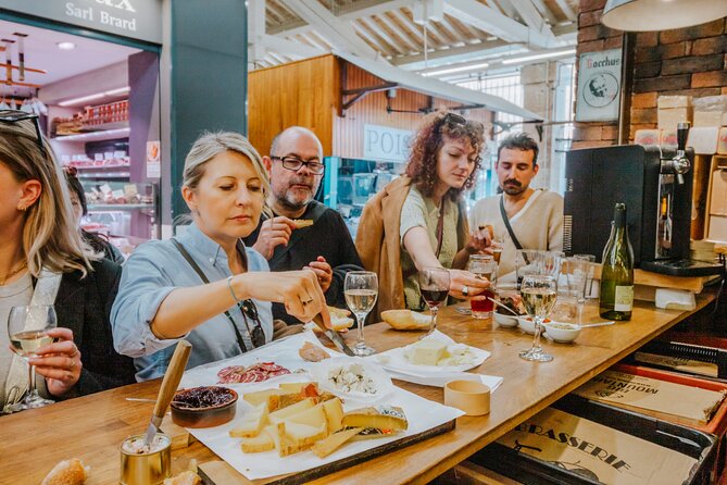 Taste of Paris Food and Bike Tour - Cycling Through Le Maraiss Historic Streets