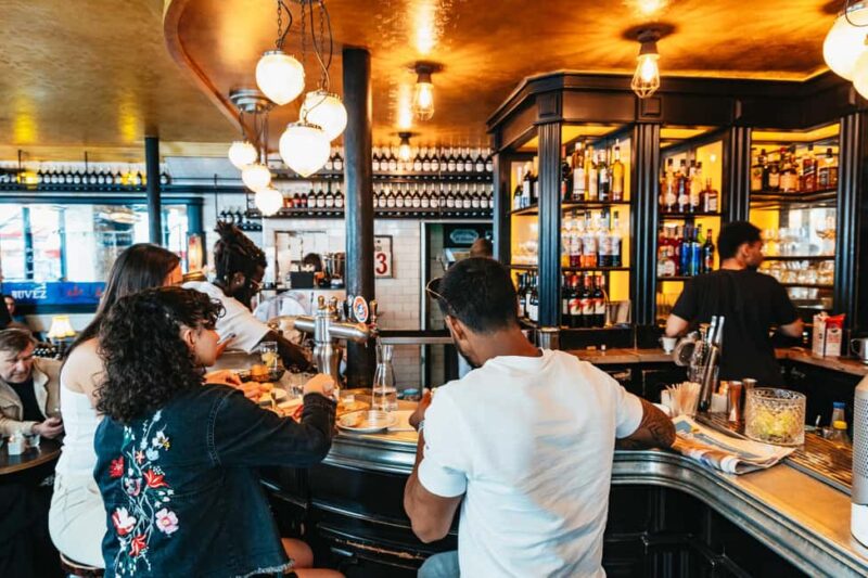 Taste True Paris Food Tour in Le Marais Hidden Gems - Visiting a Traditional French Market in Le Marais