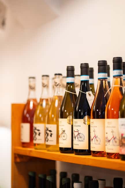 Tasting local wines with snacks in Rapallo's historic center. - Key Points