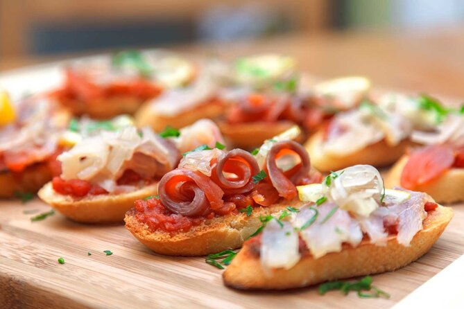 Tasty Tapas & Drinks Tour with a Rooftop Included - Starting Point: From Tirso de Molina to the Heart of Madrid