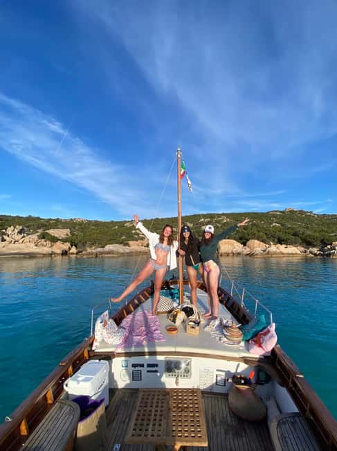 Tavolara: Sunset Aperitif Tour with Drinks and local snacks - Exploring Tavolara Island’s Breathtaking Cliffs and Marine Views