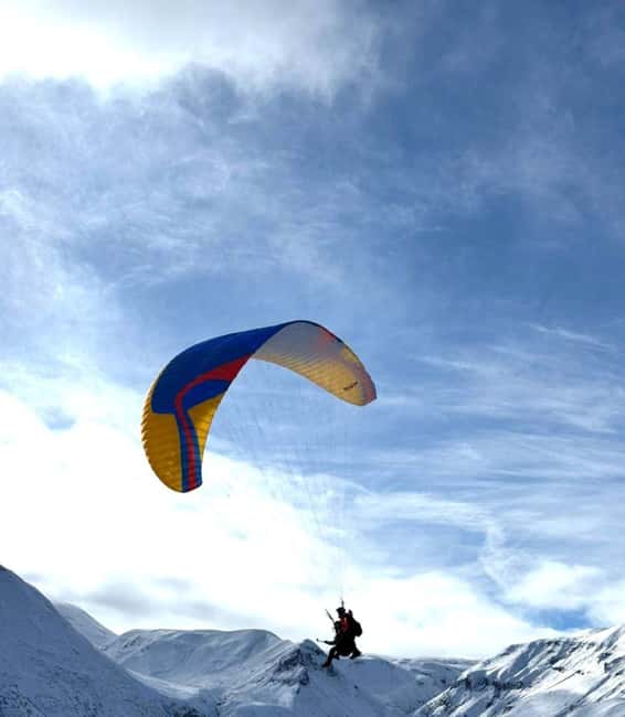 Tbilisi: Escape to Gudauri  Ski, Snowmobile & Scenic Views - Snow Activities in Gudauri: Skiing, Snowmobiling, and Paragliding
