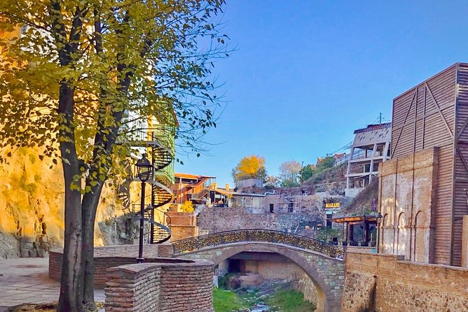 Tbilisi Explorer: Essential Walking Tour for First-Timers - Walking Through the Iconic Bridge of Peace and Sayat-Nova Monument