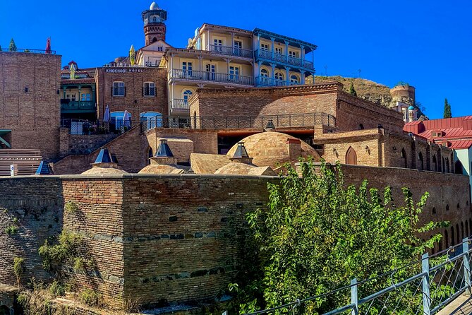 Tbilisi Walking Tour Including Wine Tasting Cable Car and Bakery - Rezo Gabriadze Marionette Tower and Its Charm