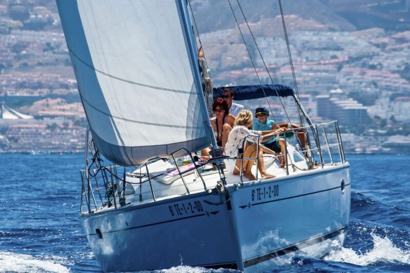 Tenerife: Sailboat Tour Whale Watching Food and Snorkeling - Snorkeling in Tenerife’s Warm Waters