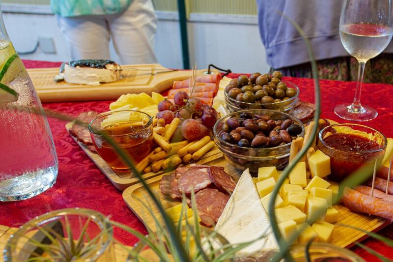 Terceira: Volcanic Wine Tasting Tour with Tapas - Savoring Local Tapas in a Charming Garden Setting