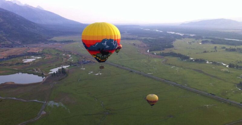 Teton Village: Grand Tetons Sunrise Hot Air Balloon Tour - Landing and Champagne Celebration