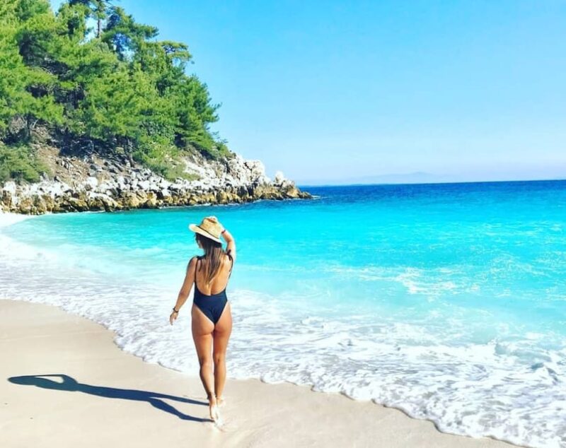 Thassos: Full-Day Cruise with BBQ and Swim Stops - Socializing, Music, and Dancing on the Cruise