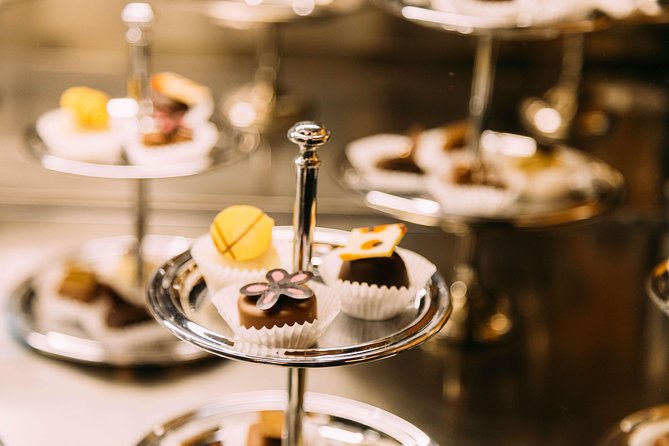 The 10 Tastings of Bruges With Locals: Private Food Tour - Sampling Bruges’s Iconic Waffles and Belgian Frites