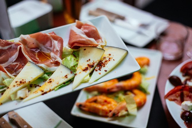 The 10 Tastings of Valencia With Locals: Private Food Walking Tour - Discovering the Serranos Towers and Their Cultural Role