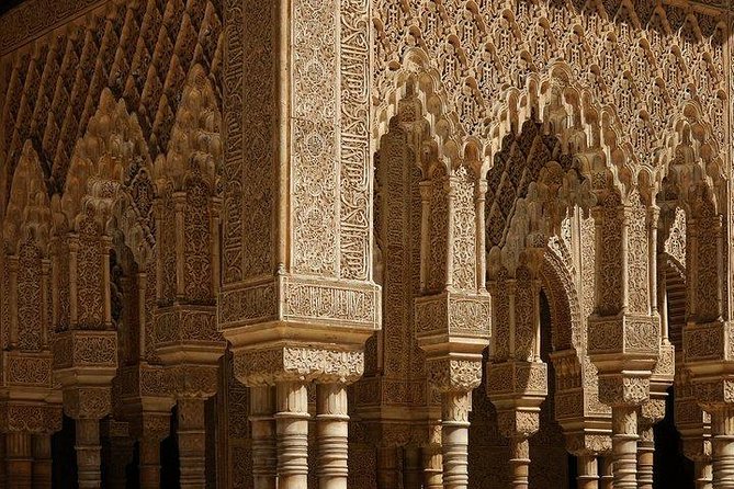 The Best of Alhambra & Granada: Private Tour with Nasrid Palaces - Visiting La Madraza and Corral del Carbon