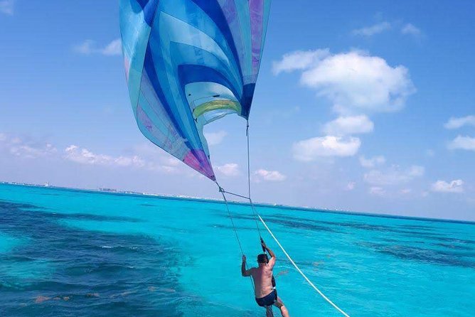 The best tour to Isla Mujeres Catamaran, open bar& lunch included - Additional Costs and Practical Tips