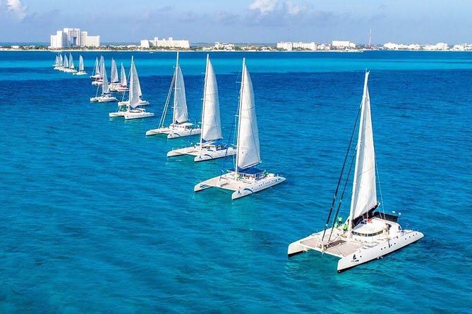 The best tour to Isla Mujeres Catamaran, open bar& lunch included - Weather and Cancellation Policies