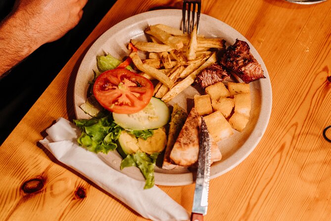 The Espetada Evening Food and Cultural Tour - Guide Expertise and Atmosphere