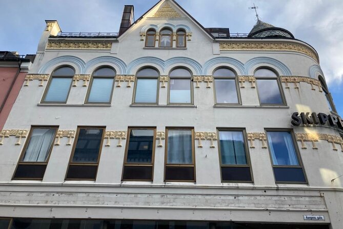 The Essence of Ålesund Self-Guided Walking Tour - Key Points