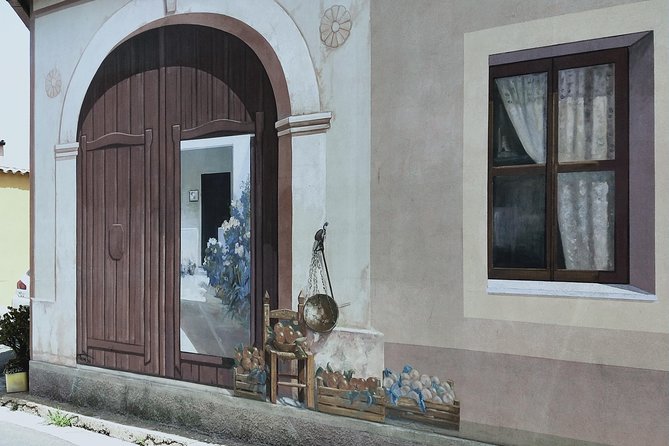 The open air art gallery of San Sperate and Pinuccio Sciola's Sounding Stones - Explore San Sperate’s Vibrant Murals in an Open-Air Art Museum