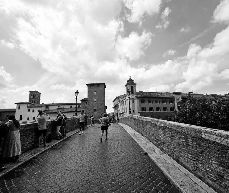 The Shadows of Rome: Between Legends and Spirits - Crossing Ponte Garibaldi to Tiber Island