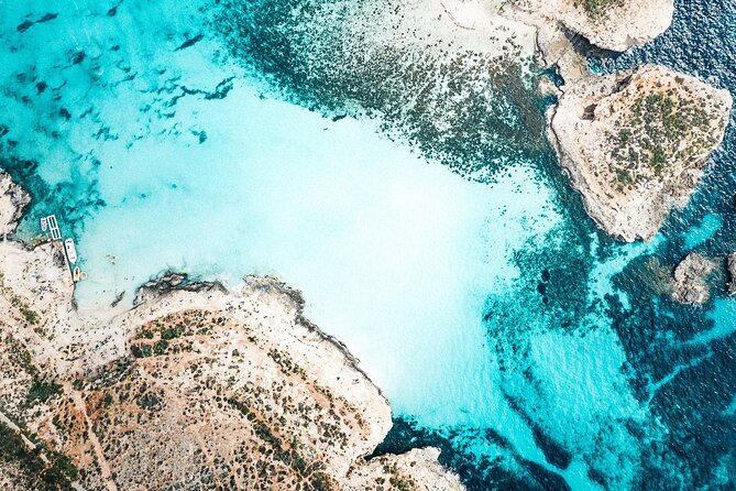 Three Bay Cruise Including Blue Lagoon from Mellieha - alfa Rock Bay: A Hidden Gozitan Treasure