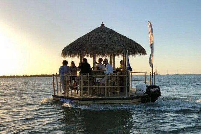 Tiki Boat - Clearwater - The Only Authentic Floating Tiki Bar - Spot Marine Wildlife and Take a Dip in Warm Waters