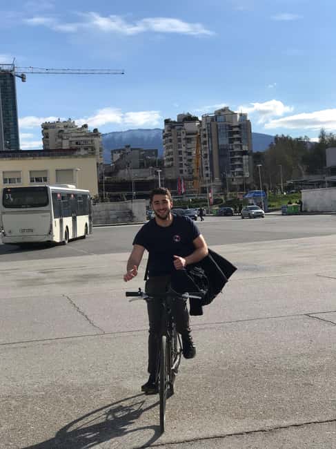 Tirana Bike Tour  Discover the Capital on Two Wheels - Crossing Vodafone Bridge to Tirana Castle