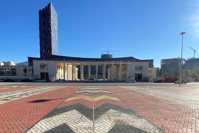 Tirana Express Walking Tour - Essential of the Albanian Capital - Experiencing Communist Era Artifacts at Komiteti Bar