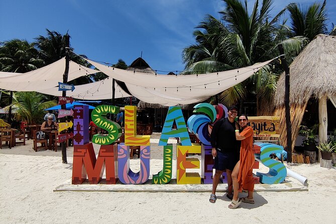 Top Isla Mujeres Catamaran Tour with Snorkel Open Bar and Buffet lunch - Enjoy Unlimited Drinks and Music Throughout the Day