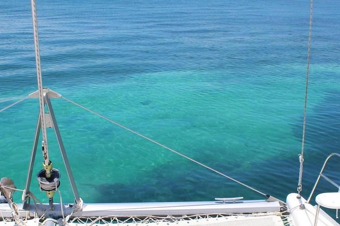 Top Tour Sail To Isla Mujeres By Catamaran Buffet And Drinks Included - Exploring Isla Mujeres: Shops and Scenic Walks