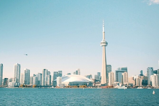 Toronto Highlights Walking Tour with CN Tower & Harbour Boat Ride - Logistics, Meeting Point, and Accessibility