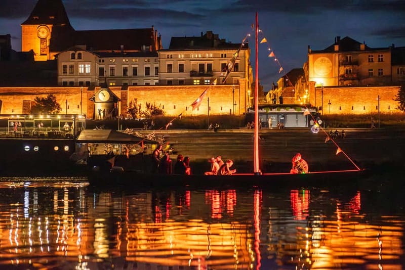 Toru: Toru at Night from a Boat on the Vistula - The Charm of Traditional Wooden Vistula Boats