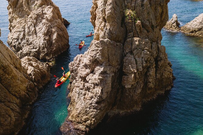 Tossa de Mar: Kayak & Snorkel Tour with Paella from Barcelona - Discovering the Old Town and Castle of Tossa de Mar