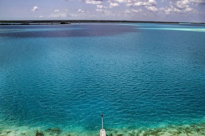 Tour Bacalar + Pontoon Ride Lagoon from Cancún & Playa del Carmen - Discovering Cenote Cocalitos with Scenic Amenities