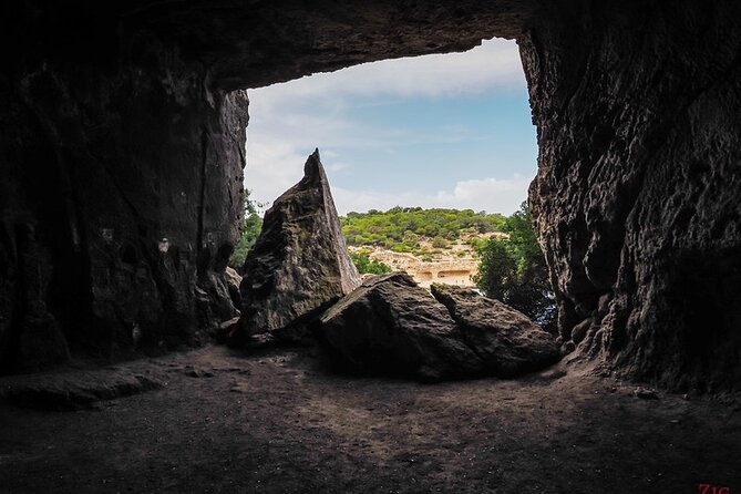 Tour Beach Portal Vells, Cave Portal Vells. - Flexibility and Booking Details