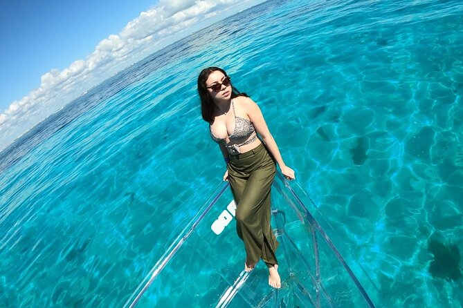 Tour Isla Mujeres excursion in Collective Transparent Boat - Expert Guides and Small Group Atmosphere