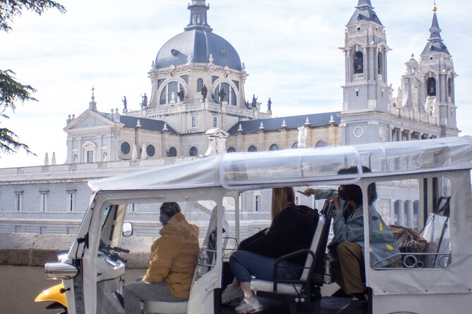 Tour of Historic and Modern Madrid with a guide in a yellow tuk tuk - Logistics: Meeting Point and Flexibility