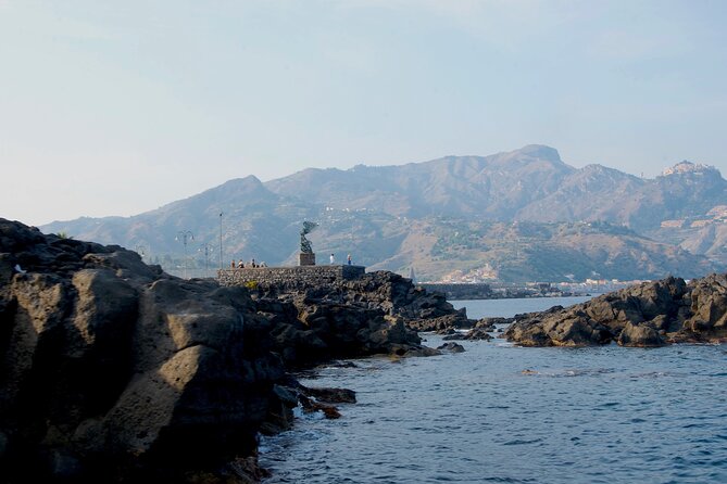 Tour to Baia di Taormina, Isola Bella and Naxos - The Experience: Atmosphere, Music, and Family-Friendly Vibe