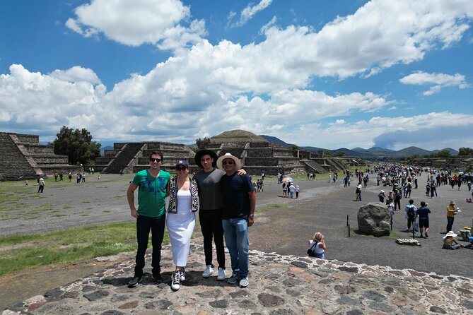 Tour to Teotihuacan with visit to ancient caves and CDMX transportation - Iconic Pyramids of Teotihuacan and Guided Exploration