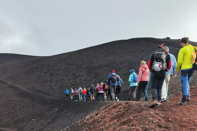 Tour to the Summit Craters of Etna 2920 meters with cable car and Jeep - Exploring a Lava Cave with Helmets and Flashlights