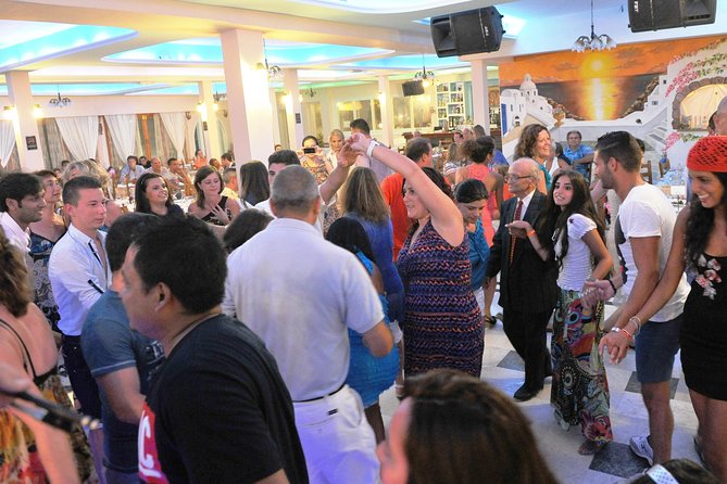 Traditional Greek Night live Music & Dinner Show in Santorini - Cultural Highlights: Greek Traditions on Display