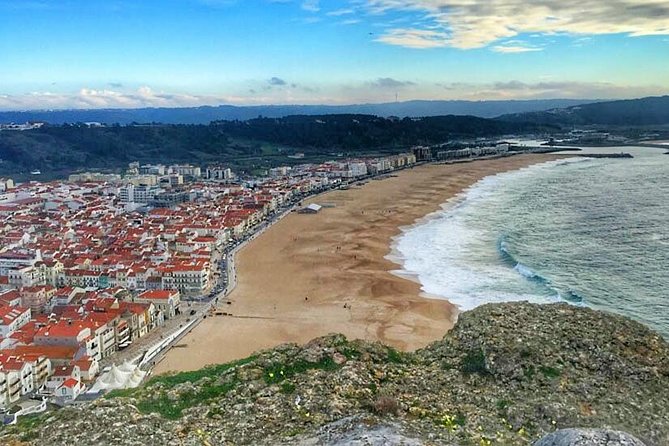 Transfer from Lisbon to Porto with visits on the way - Nazaré: From Fishing Village to Surfing Legend