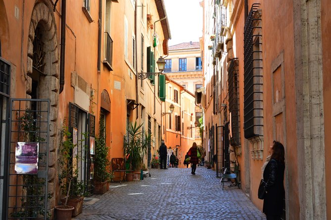 Trastevere and Rome Jewish Ghetto Small Group Walking Tour - Visiting Isola Tiberina: The Legend of Romulus and Remus