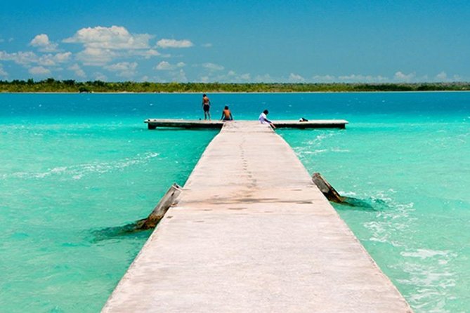 Travel Boat in Pontoon to Bacalar & Cenote Azul from Cancun - Swimming at Cenote Azul: The Natural Wonder