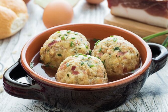 Trento Walking Tour with Audio and Written Guide - Walking Through Piazza Fiera and Seeing Medieval Walls