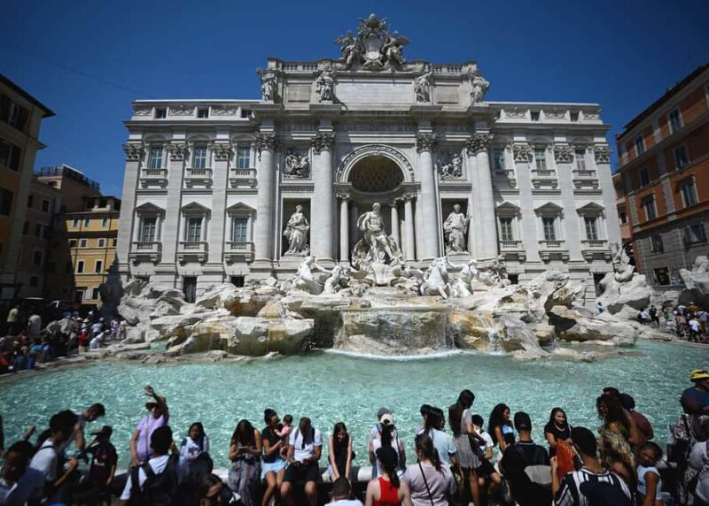 Trevi Fountain Tour: Explore Ancient Aqueduct & Roman Ruins - The Surface View and Iconic Fountain Details